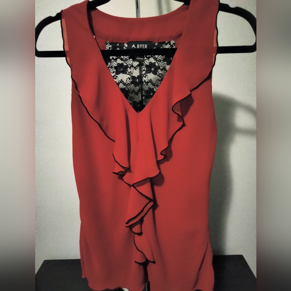A. Byer sleeveless, ruffled, red, and lace blouse
